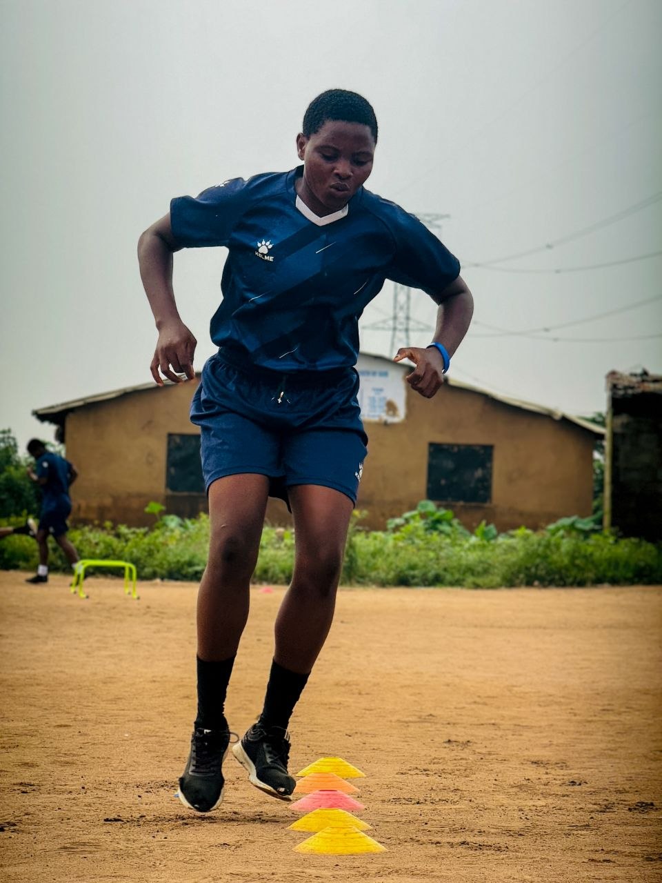 BlueWhale player executing an agility drill over cones